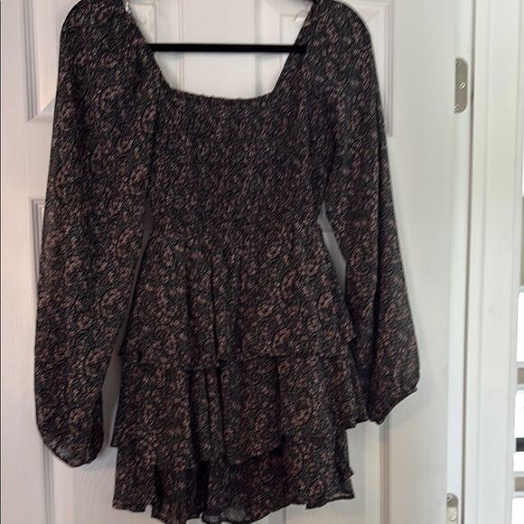 Ruffled romper by Entro! Sheer sleeves! Looks like a dress!